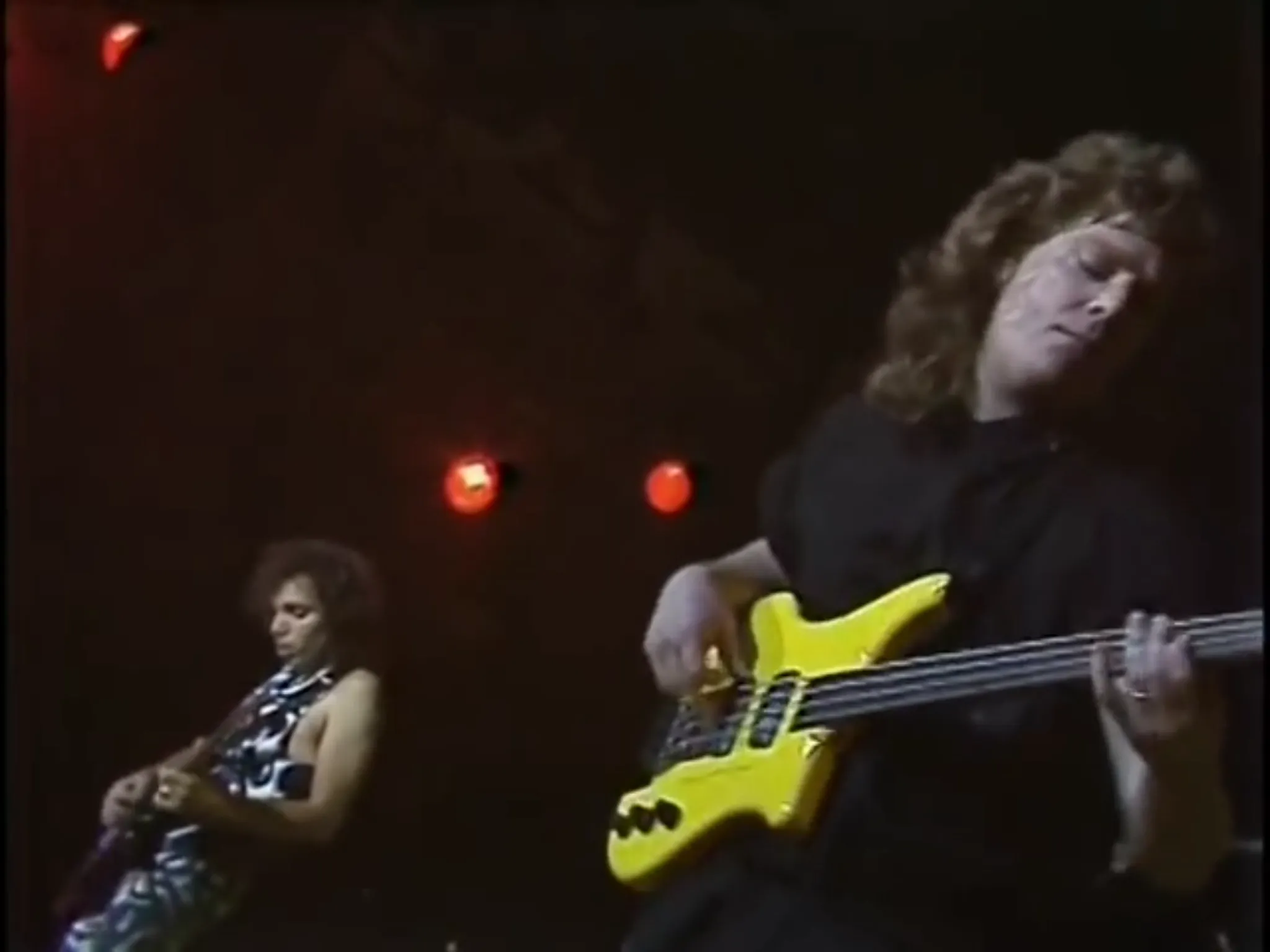 Stu Hamm performing with Joe Satriani